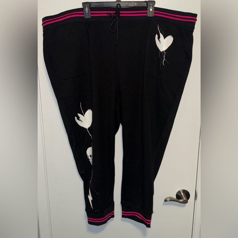 Torrid Lovesick Black Joggers with White Heart Pattern and Pink Trim